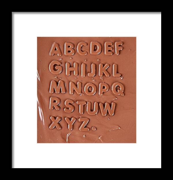 Melting Framed Print featuring the photograph Chocolate Alphabet by MediaProduction