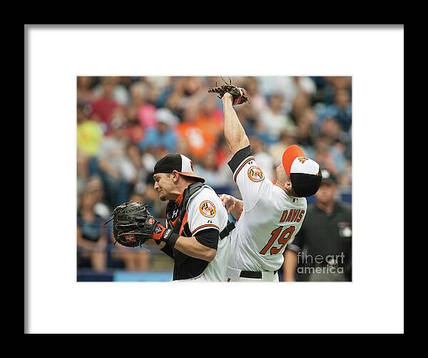 American League Baseball Framed Print featuring the photograph Chris Davis and Caleb Joseph by Cliff Mcbride