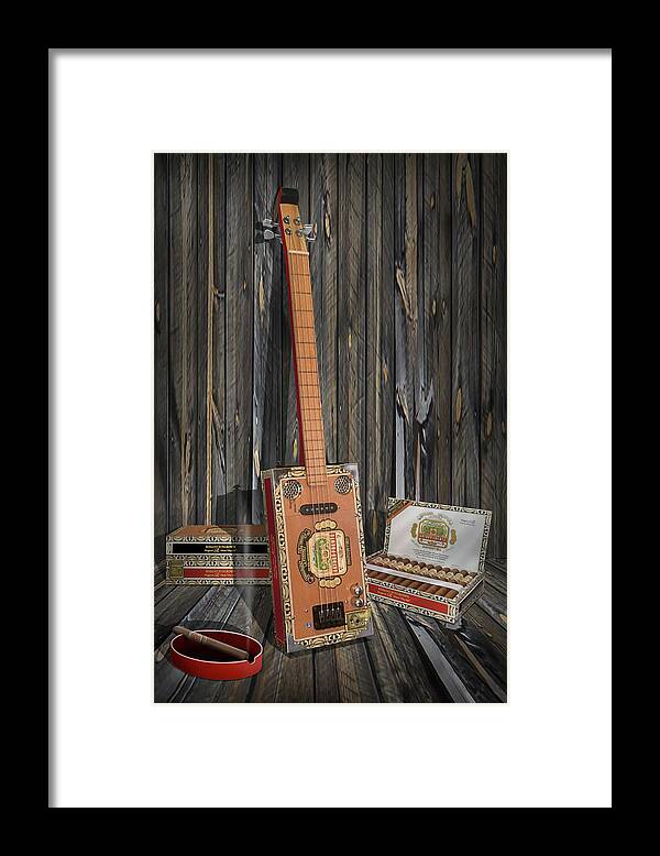 Guitar Framed Print featuring the photograph Cigar Box Guitar by Mike McGlothlen