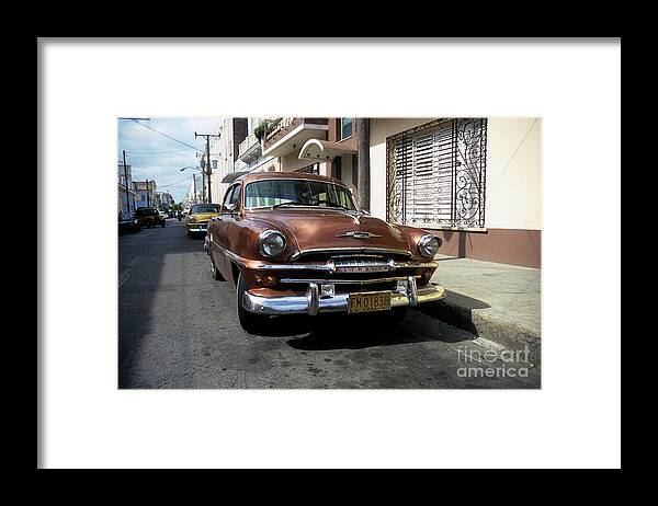 Cuba Framed Print featuring the photograph Classic 1950s Plymouth in Santiago Cuba by James Brunker