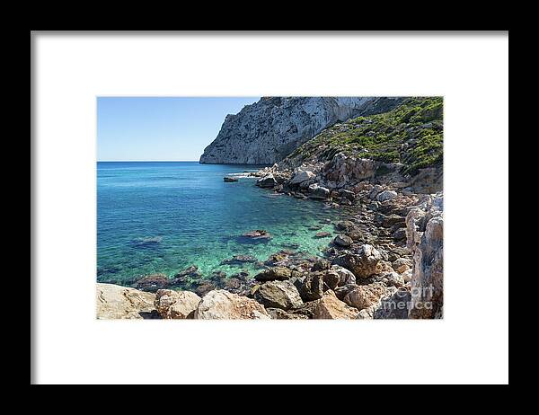 Mediterranean Coast Framed Print featuring the photograph Turquoise sea water and cliffs by Adriana Mueller