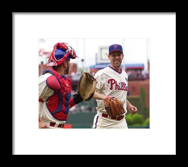 Baseball Catcher Framed Print featuring the photograph Cliff Lee and Wil Nieves by Mitchell Leff