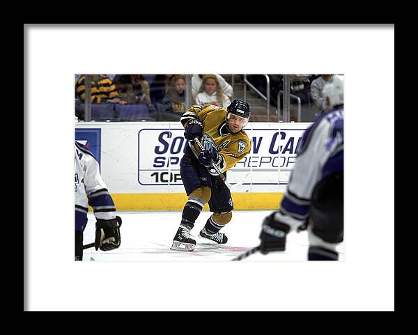 National Hockey League Framed Print featuring the photograph Cliff Ronning shoots the puck by Robert Laberge