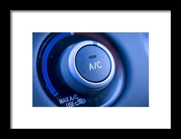 Cool Attitude Framed Print featuring the photograph Close up of air conditioning button in a car by MarkCoffeyPhoto