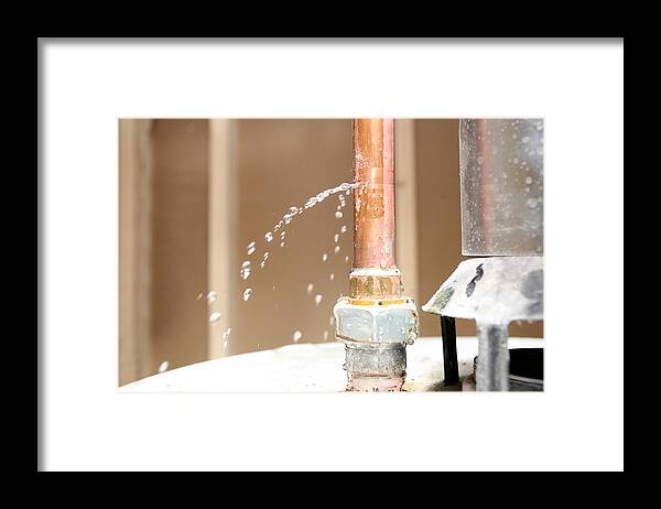 Pipe Framed Print featuring the photograph Close-up of drain pipe leaking water by DIGIcal