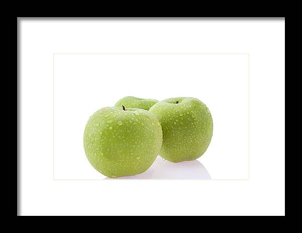 Granny Smith Apple Framed Print featuring the photograph Close-up of green apples by Ravi Ranjan