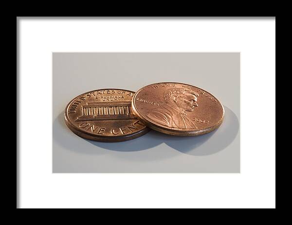 Coin Framed Print featuring the photograph Close up of two pennies by Tetra Images