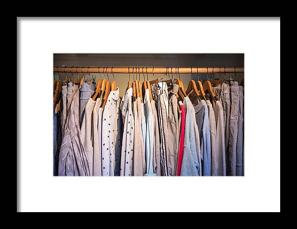 Color Image Framed Print featuring the photograph Clothes on rail in shop, close-up by Russ Rohde