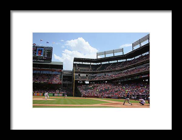 Second Inning Framed Print featuring the photograph Colby Lewis and Trevor Plouffe by Ronald Martinez