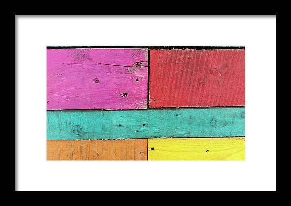 Colorful Boards Caribbean Pink Red Yellow Blue Orange Framed Print featuring the photograph Colorful Boards in the Caribbean by David Morehead