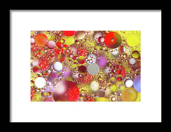 Abstract Framed Print featuring the photograph Colorful Bubbles in Oily Water by Charles Floyd