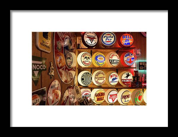 Gas Pump Globes Framed Print featuring the photograph Colorful Gas Pump Globes by Kathleen Bishop
