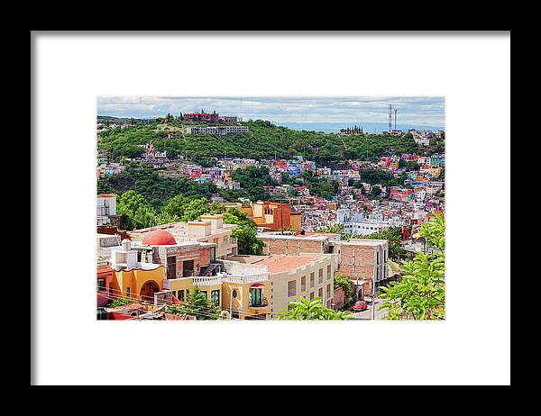 Guanajuato Framed Print featuring the photograph Colorful hilltop houses in Guanajuato, Mexico 2 by Tatiana Travelways