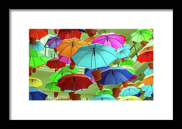 Colorful Umbrellas Melbourne Australia Framed Print featuring the photograph Colorful Umbrellas in Melbourne, Australia by David Morehead