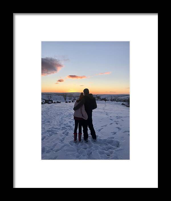 People Framed Print featuring the photograph Couple looking at sunset in snow by Heidi Coppock-Beard