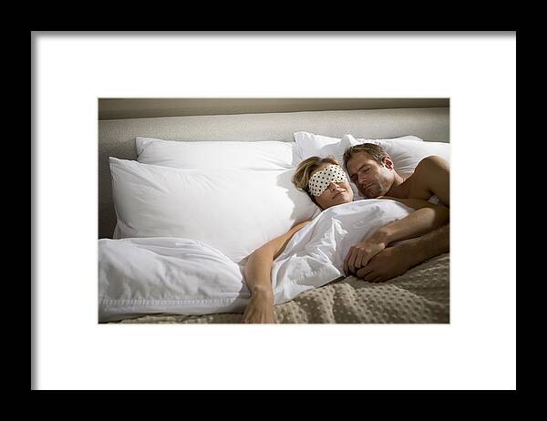 Blanket Framed Print featuring the photograph Couple sleeping in bed together by Le Club Symphonie