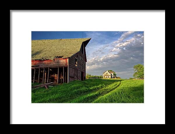 Abandoned Framed Print featuring the photograph Day's Work is Done at the Solberg Homestead - abandoned barn and homestead in Benson County ND by Peter Herman