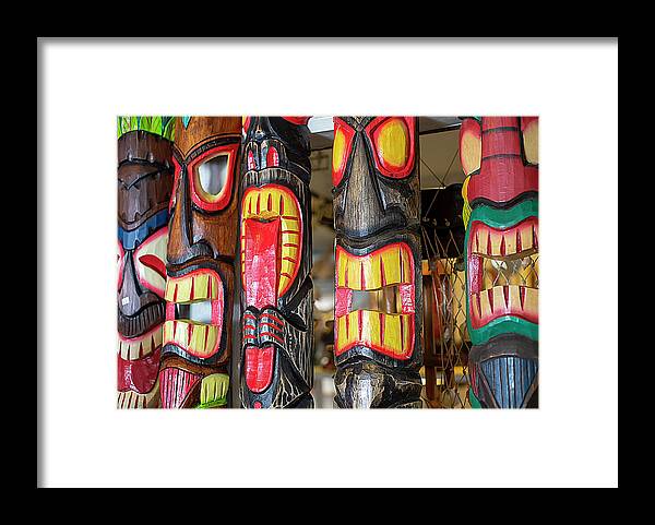 Tiki Mask Framed Print featuring the photograph Decorative Tiki Masks by Dart Humeston