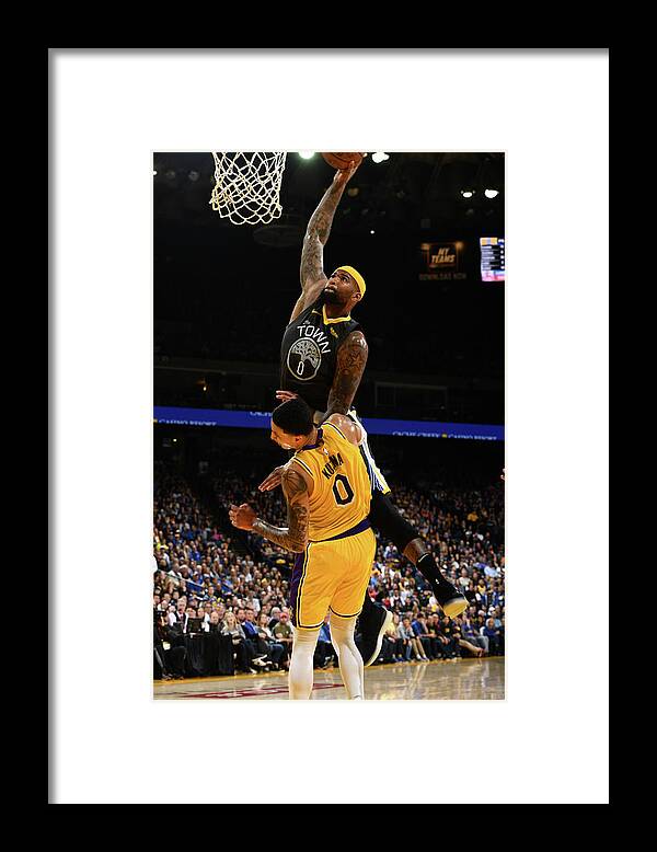 Nba Pro Basketball Framed Print featuring the photograph Demarcus Cousins and Kyle Kuzma by Garrett Ellwood
