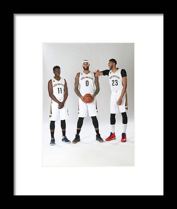 Jrue Holiday Framed Print featuring the photograph Demarcus Cousins, Jrue Holiday, and Anthony Davis by Layne Murdoch