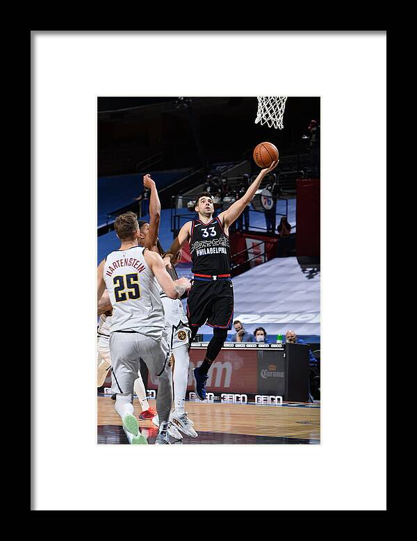 Dakota Mathias Framed Print featuring the photograph Denver Nuggets v Philadelphia 76ers by David Dow