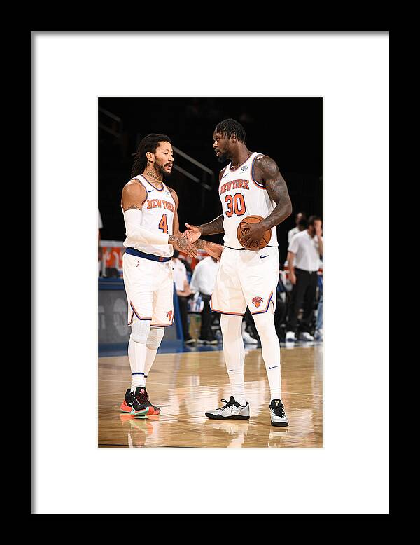Nba Pro Basketball Framed Print featuring the photograph Derrick Rose and Julius Randle by Garrett Ellwood