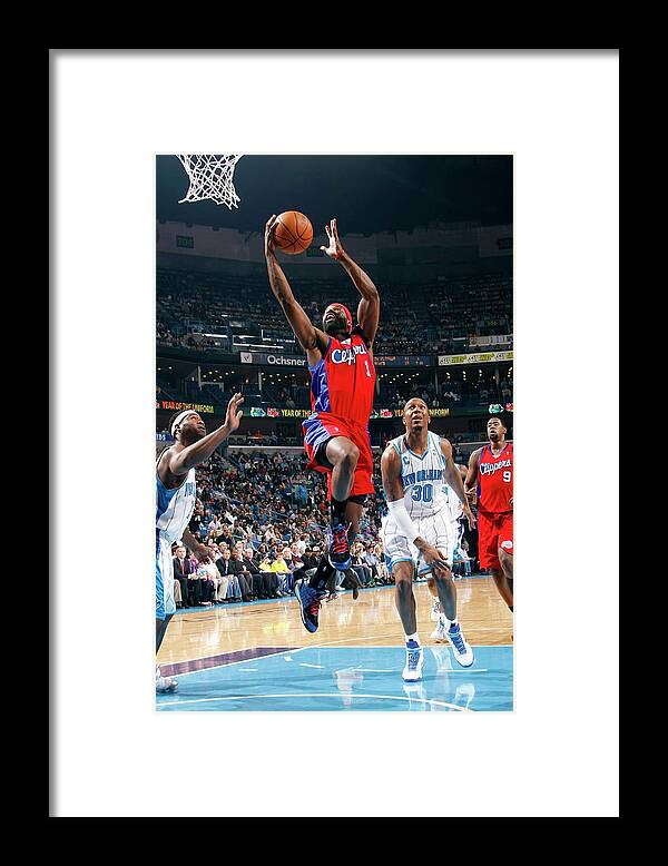 Smoothie King Center Framed Print featuring the photograph Devin Brown, Baron Davis, and David West by Layne Murdoch