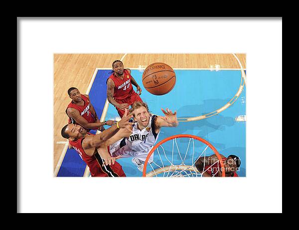 Playoffs Framed Print featuring the photograph Dirk Nowitzki, Juwan Howard, and Lebron James by Andrew D. Bernstein
