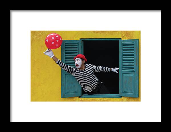 Clown Framed Print featuring the photograph Don't fly away by Anges Van der Logt