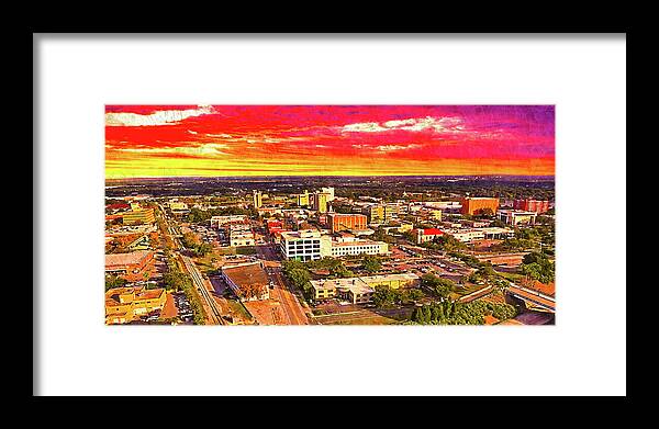 Downtown Lakeland Framed Print featuring the digital art Downtown Lakeland, Florida, at sunset - digital painting by Nicko Prints