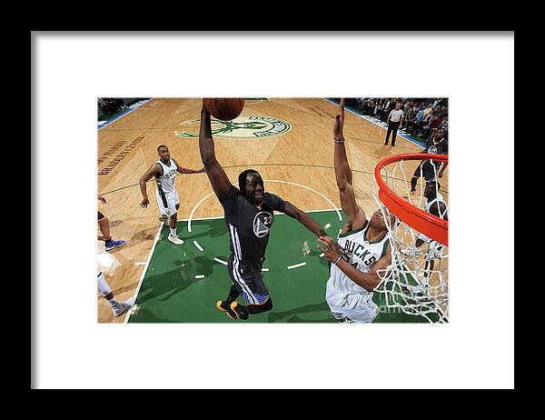 Nba Pro Basketball Framed Print featuring the photograph Draymond Green and Giannis Antetokounmpo by Gary Dineen