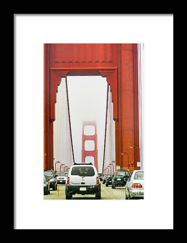 Golden Gate Bridge Framed Print featuring the photograph Driving into low clouds and fog on the Golden Gate Bridge by Gunther Allen
