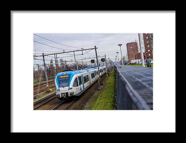 Passenger Train Framed Print featuring the photograph Dutch train at Amersfoort by JanJBrand