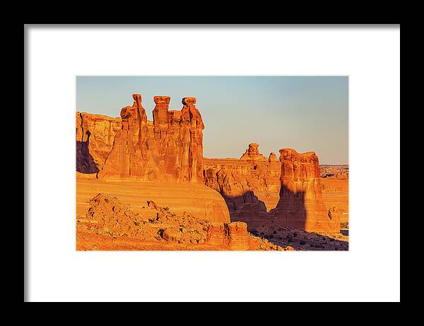 Landscape Framed Print featuring the photograph Early Morning Light on the Three Gossips by Marc Crumpler