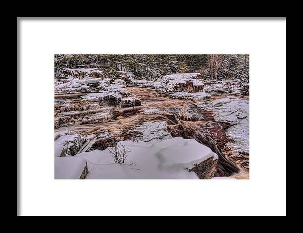 Eau Claire Dells Framed Print featuring the photograph Eau Claire River Flow Through The Snow by Dale Kauzlaric