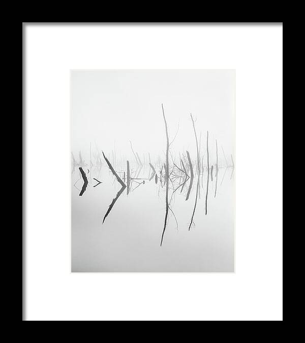 Abstract Framed Print featuring the photograph Eerily Calm In Black And White by Jordan Hill