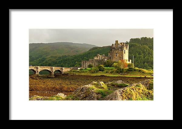 Scotland Framed Print featuring the photograph Eilean Donan Castle in the loch Alsh at the highlands of Scotlan by Michalakis Ppalis