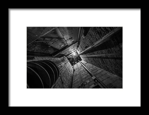 Elevator Framed Print featuring the photograph NYC Elevator Shaft by John Randazzo