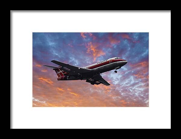 Empire Airlines Framed Print featuring the photograph Empire Airlines Fokker F.28 by Erik Simonsen