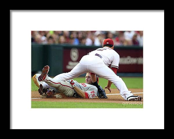 Eric Chavez Framed Print featuring the photograph Eric Chavez and Chase Utley by Christian Petersen