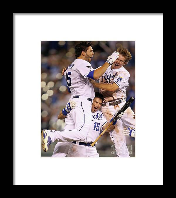 American League Baseball Framed Print featuring the photograph Eric Hosmer, Matt Treanor, and Chris Getz by Jamie Squire