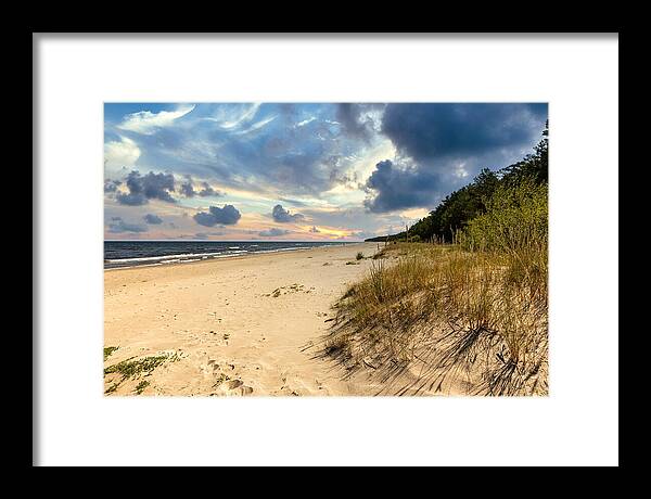 Beach Photography Framed Print featuring the photograph Evening on the summer beach Latvia by Aleksandrs Drozdovs