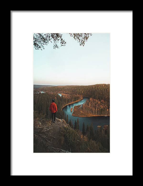 Kuusamo Framed Print featuring the photograph Explorer looks at the blue snake, the river which is surrounded by spruce forests by Vaclav Sonnek