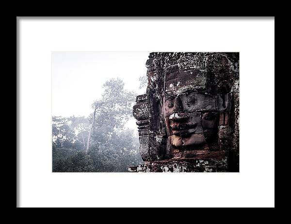Battambang Framed Print featuring the photograph Faces of Bayon in Siem Reap by Arj Munoz