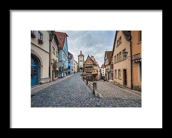 Empty Framed Print featuring the photograph Famous intersection with stunning medieval buildings in Rothenburg Germany by Michael Godek