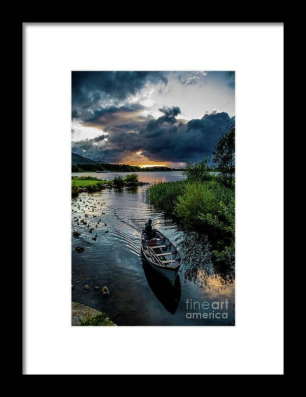 Ireland Framed Print featuring the photograph Fisher boat returns at sunset from Lough Leane in Killarney National Park in Ireland by Andreas Berthold