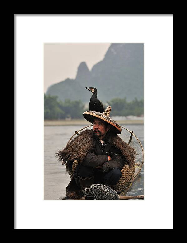 One Man Only Framed Print featuring the photograph Fisherman and Cormorant on Li River by Huang Xin
