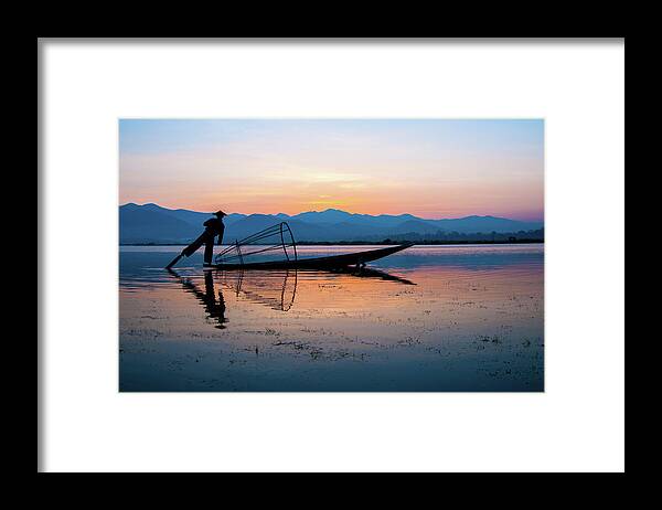 Fisherman Framed Print featuring the photograph Fisherman at Inle Lake by Arj Munoz