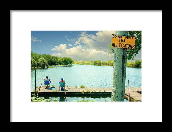 Man And Boy Fishing Photo Framed Print featuring the photograph Fishing with the Florida Gators 2 by Bob Pardue