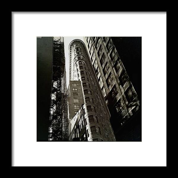 ‘flatiron Building’ Framed Print featuring the photograph Flatiron Building With A Twist by Carol Whaley Addassi